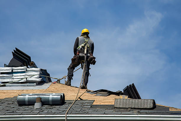 Professional Roof Replacement technician working in Clarkson, KY